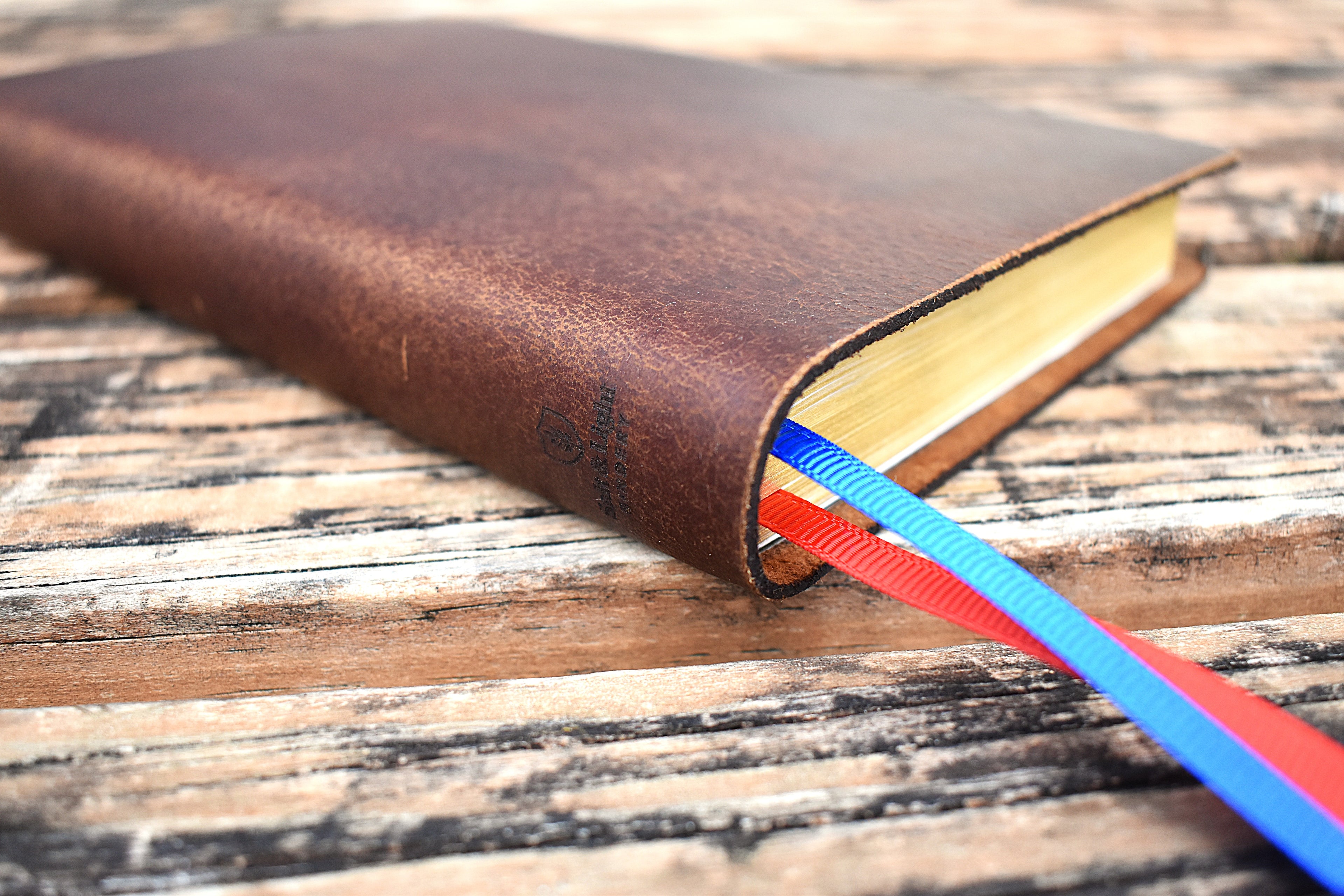 Brown handbound custom leather bible by Salt & Light Bindery
