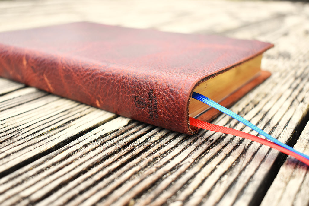 Red handbound custom leather bible by Salt & Light Bindery